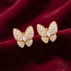 Van Cleef & Arpels, Two Butterfly earrings Gold Filled